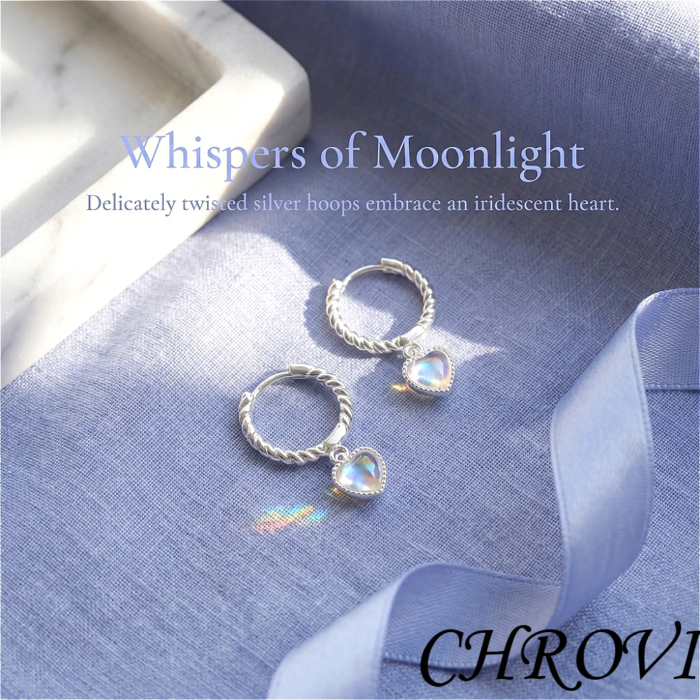 Exquisite 925 sterling silver new model twisting heart-shaped moonstone women's simple and niche ear ring