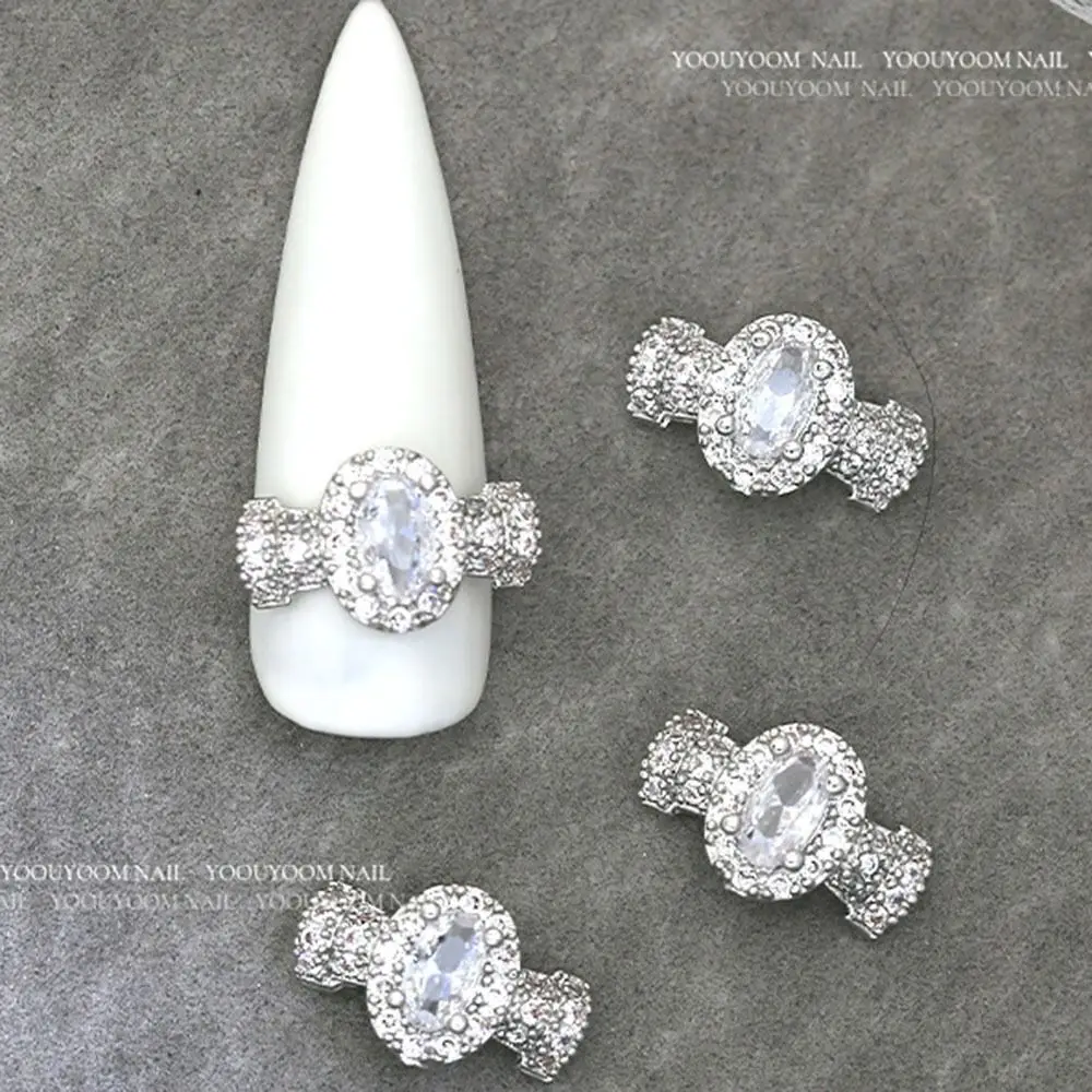 Accesorios para uñas, joyería de manicura 3D plateada, lazo, diamantes de imitación de cristal de Metal para uñas, decoración artística de uñas de mariposa a la moda para mujer