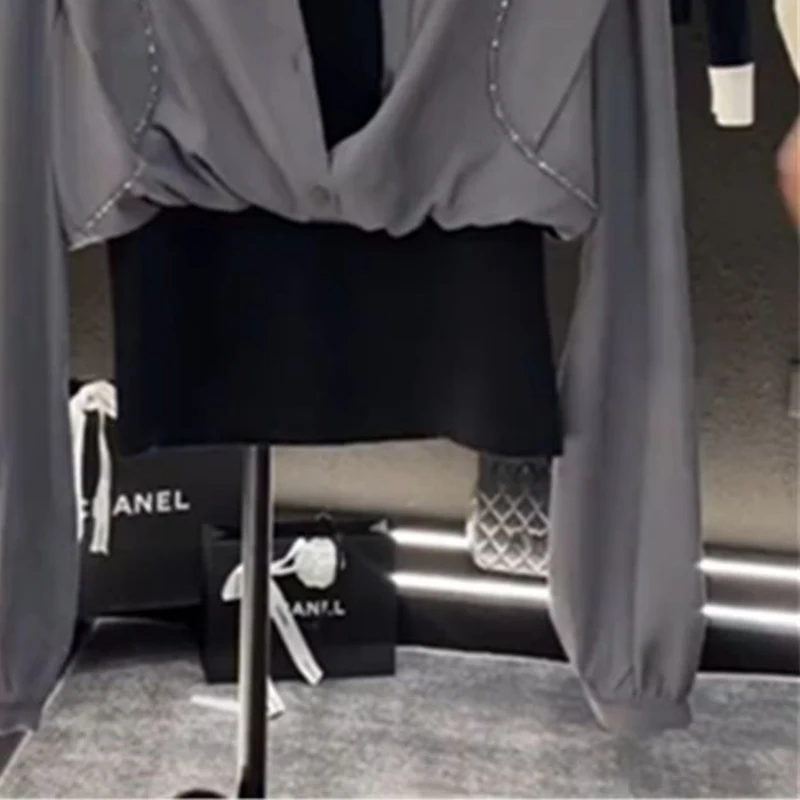 Fake two-piece long-sleeved shirt female summer design sense niche stitching retro temperament Joker fashion slim top.