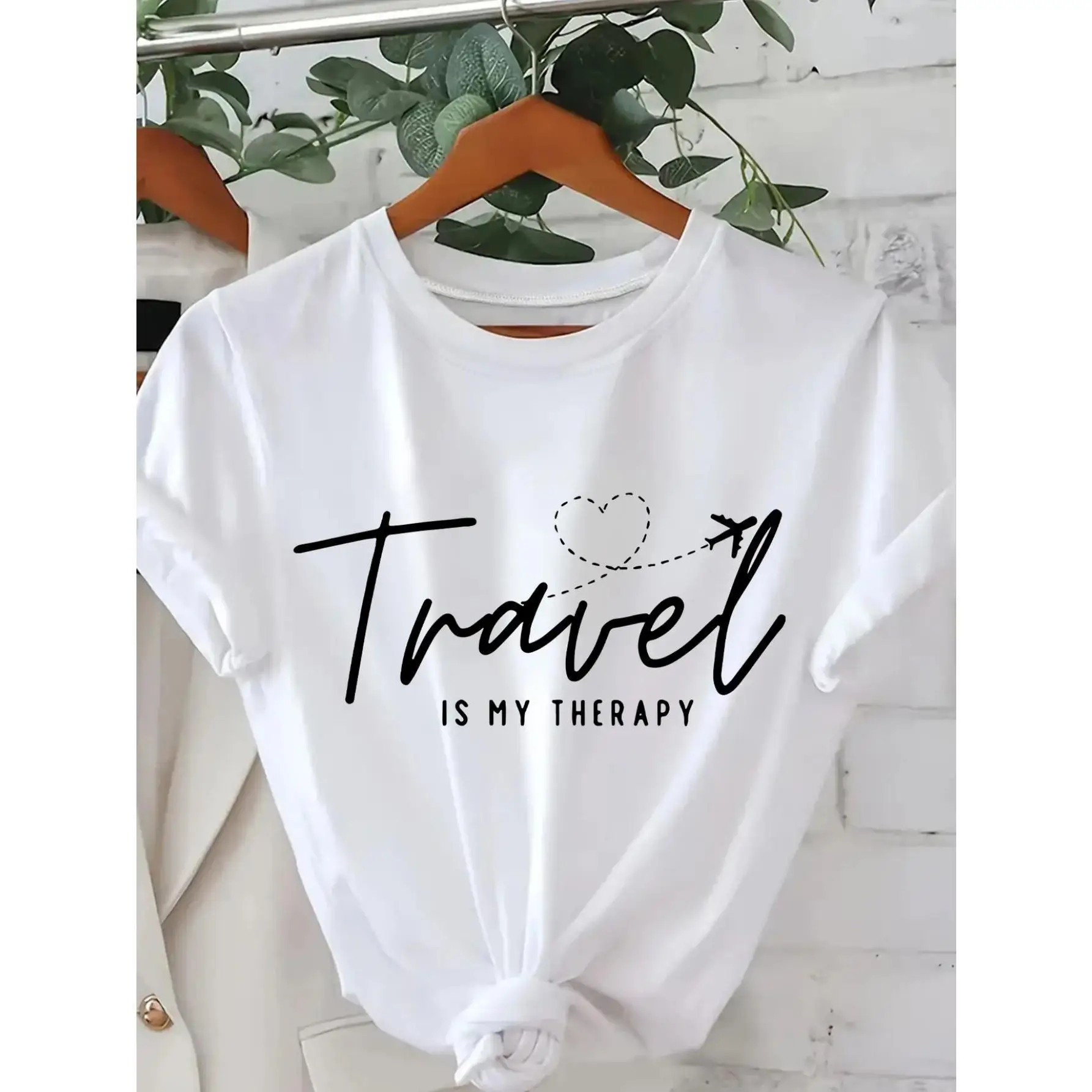 

Women's "Travel is My Relax" Graphic Cotton T-Shirt - Loose Fit Short Sleeve Round Neck Casual Top with Airplane & Heart Design