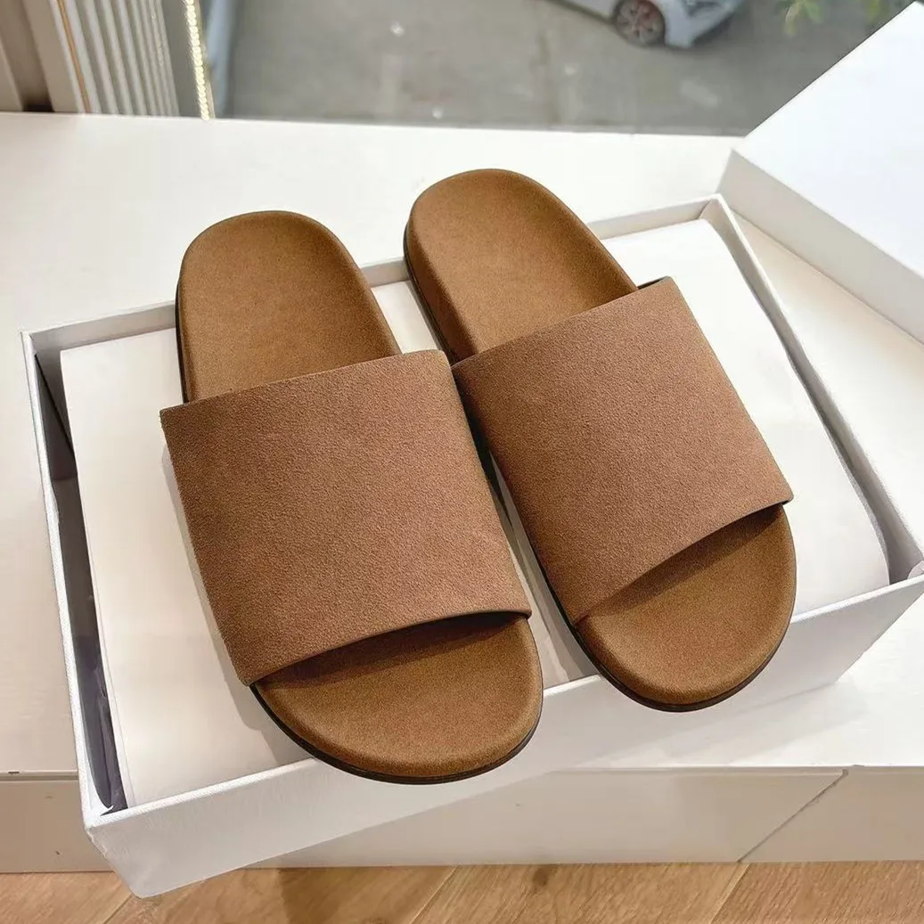 Zapatillas de una palabra para mujer, ropa de abrigo, novedad de verano 2025, estilo informal, cuero mate, parte inferior plana, gamuza Simple, arrastre fresco y perezoso