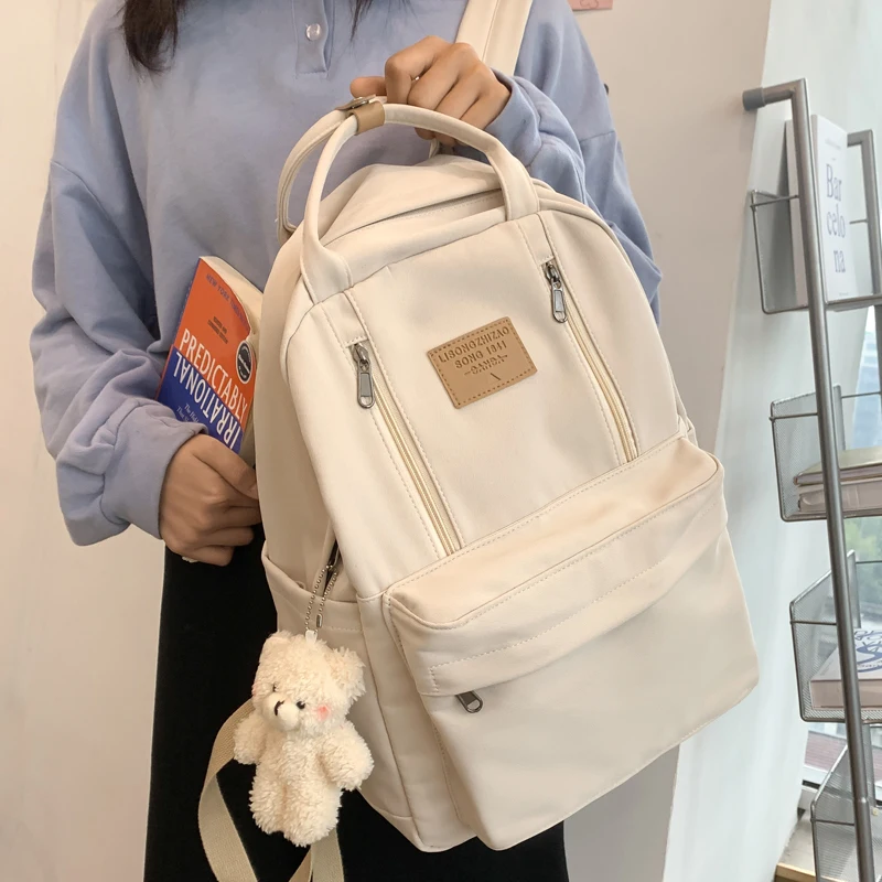 Tas ransel besar untuk wanita, tas sekolah pelajar perempuan remaja multifungsi ritsleting ganda anti-maling ringan Laptop dengan liontin