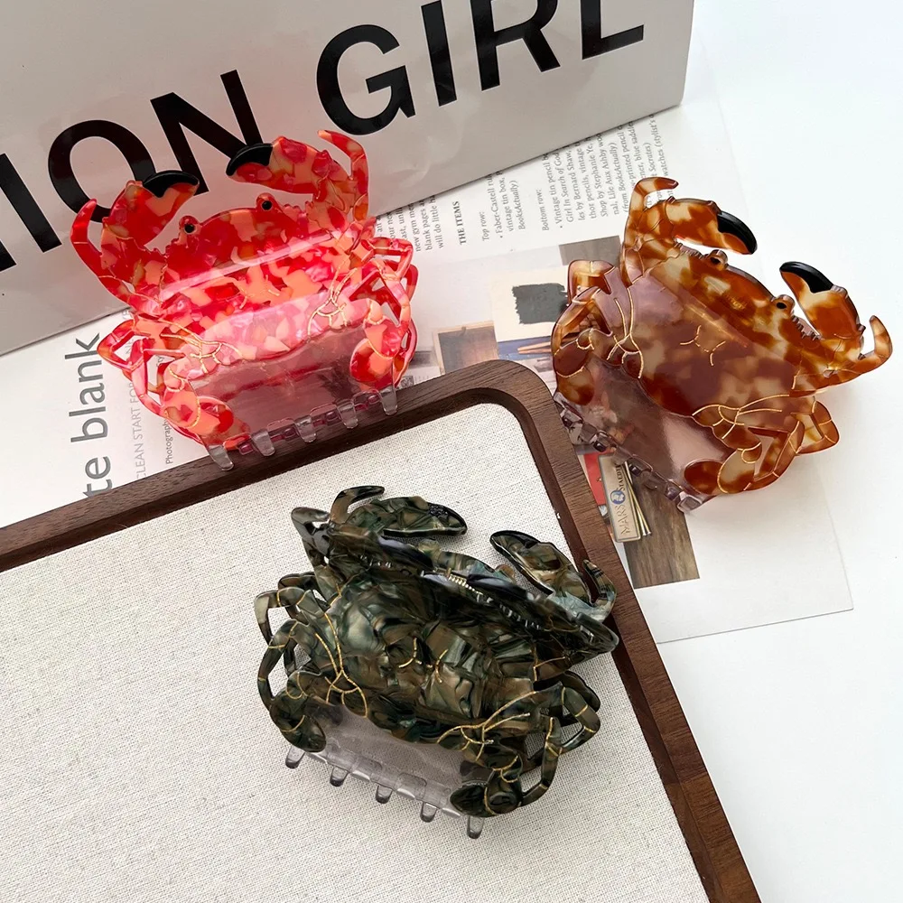 Крабовый коготь представляет собой нишевый и уникальный стиль летнего отдыха. Это изготовлен из высококачественного ацетатного материала, изготовленного вручную, с эмблемой.