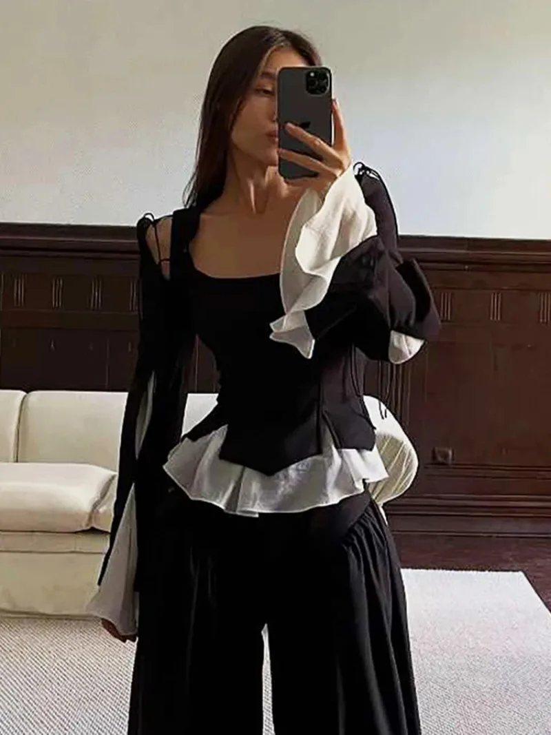 

2025 autumn and winter new women's clothing fashion personality contrasting color slimming sexy hollow lace up long sleeved top