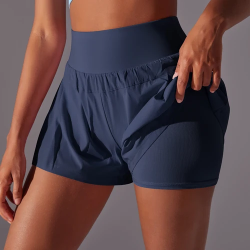 Imagen 2 del producto Pantalones cortos deportivos para gimnasio para mujer, pantalones cortos deportivos de secado rápido de doble cubierta para gimnasio, pantalones cortos de entrenamiento para correr y Fitness con bolsillo, pantalones cortos deportivos ajustados