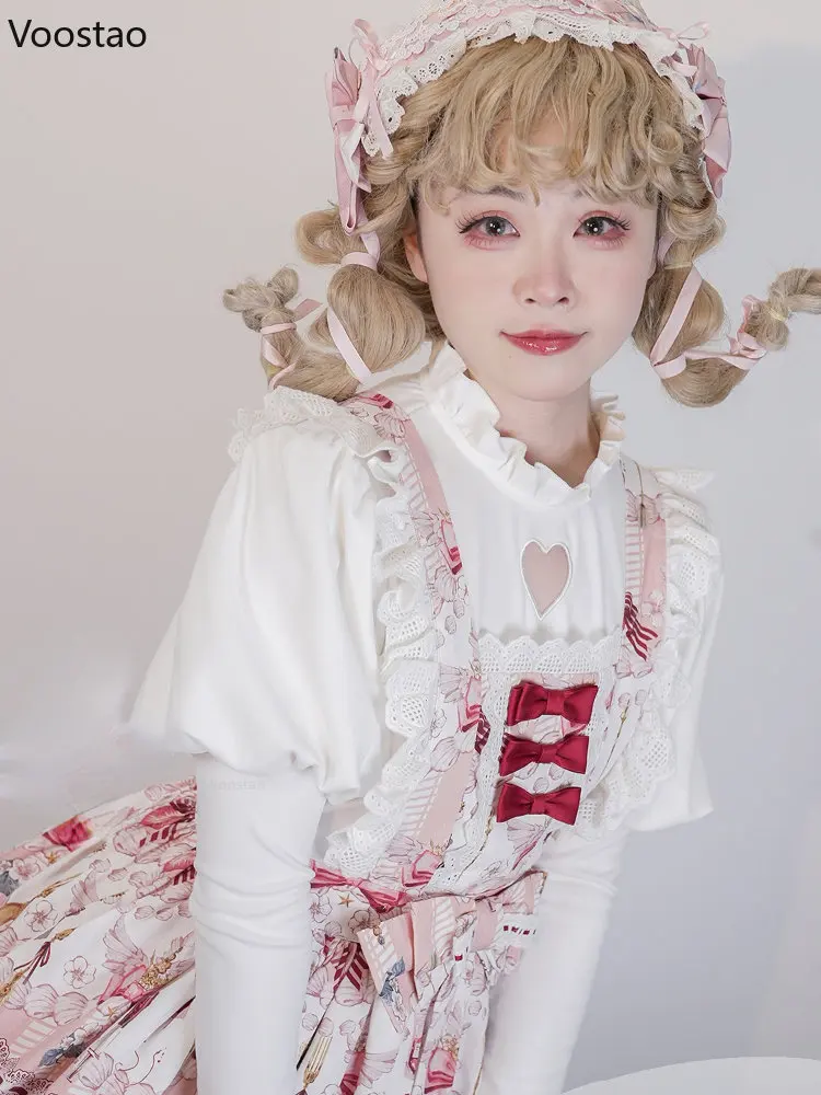 Słodki styl Lolita koszula kobiety śliczne ciepłe Ruffles O-Neck drążą miłość serce słodkie bluzki dziewczyny Harajuku Gothic Y2K wewnątrz topy