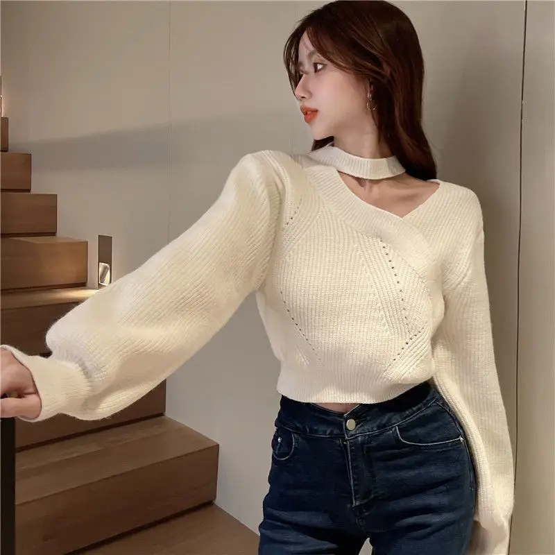 

Korean irregular hanging neck short pullover sweater women sweet and spicy high waisted sweater caution pullover female tops