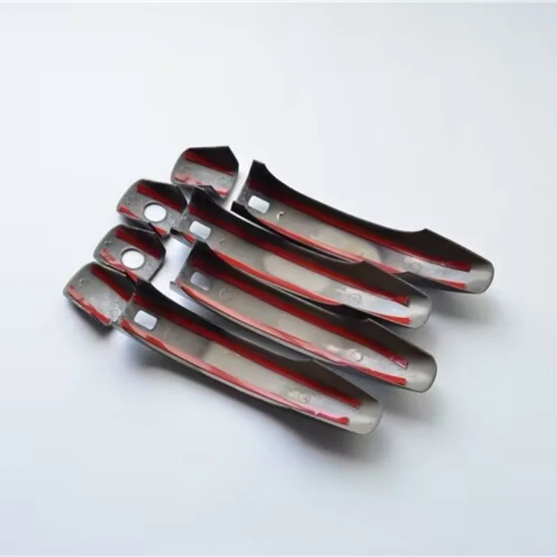 

Декоративная накладка из карбона для дверных ручек автомобилей Audi A4L, Q5L, A5, A6 (модели 2017-2025 годов)