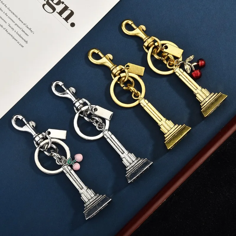 

New cherry blossom building tower keychain bag, fashionable pendant, keychain accessory bag pendant