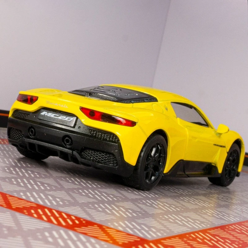 

1: 33 Simulation Maserati MC20 Alloy Car Model Pendulum with Return Force Sound and Light Children's Toy