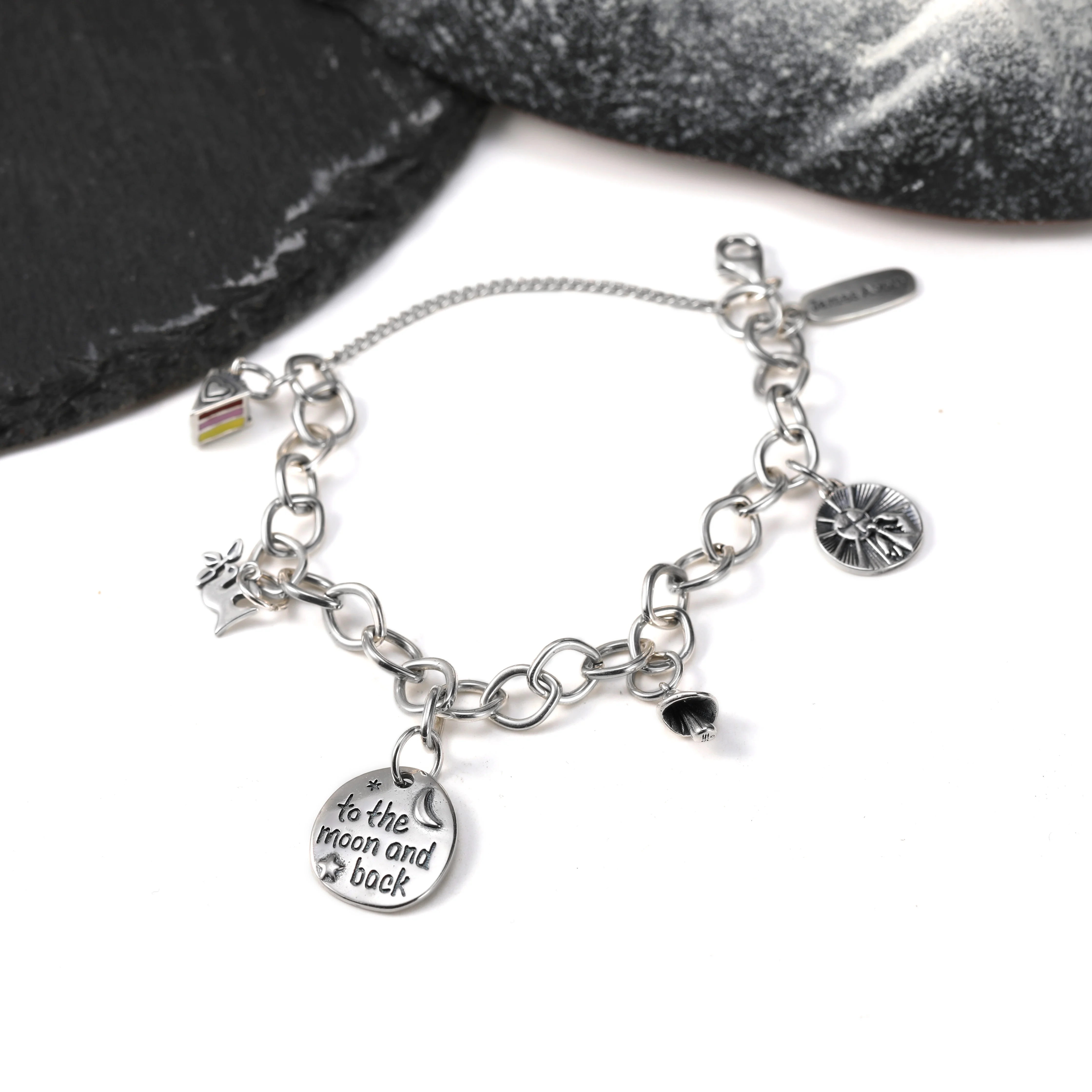 

Genuine 925 sterling silver Forged Link Charm Bracelet paired with The first sacramental medal for enamel multi-layer cake