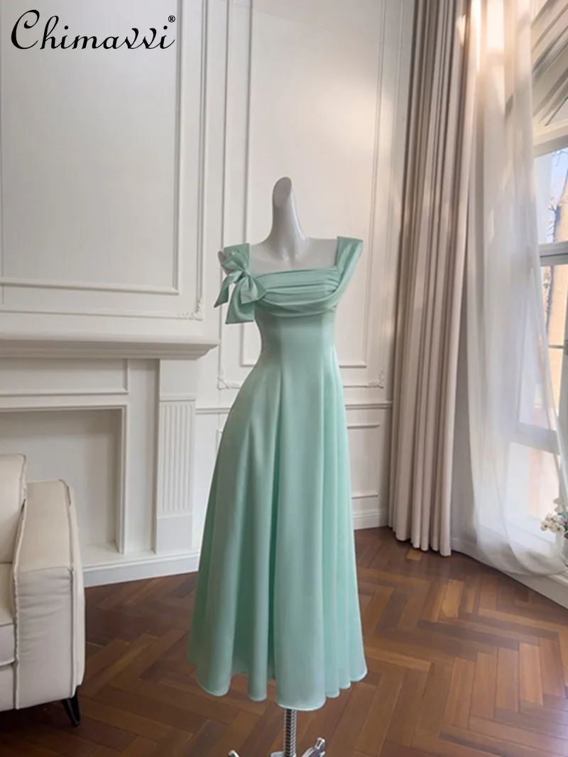 2026 lente en zomer nieuwe high-end vierkante hals strik taille satijnen jurk damesmode stropdas elegante lange feestjurk jurken