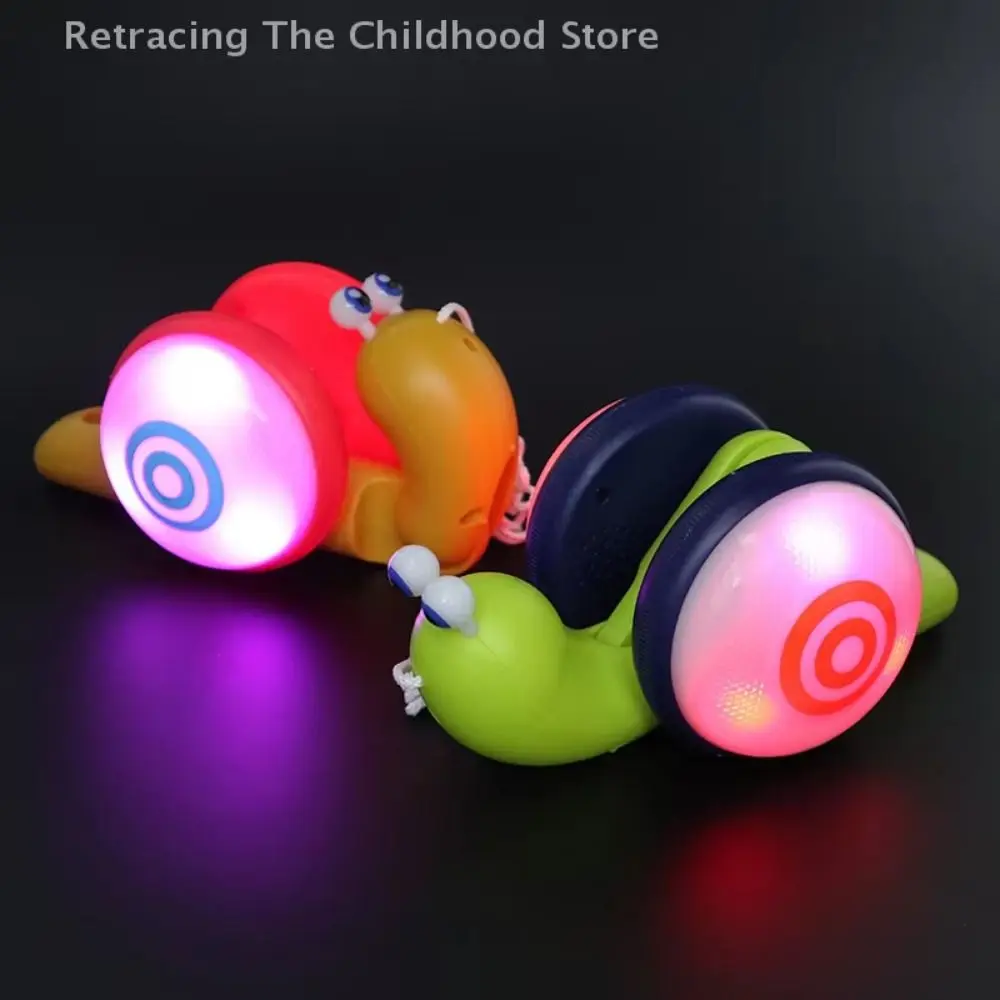 

Baby Walker Pull String Snail Car Toy Cartoon Pet Learning To Walk Drag Rope Snail Interactive with Music Pull-Along Snail Toy