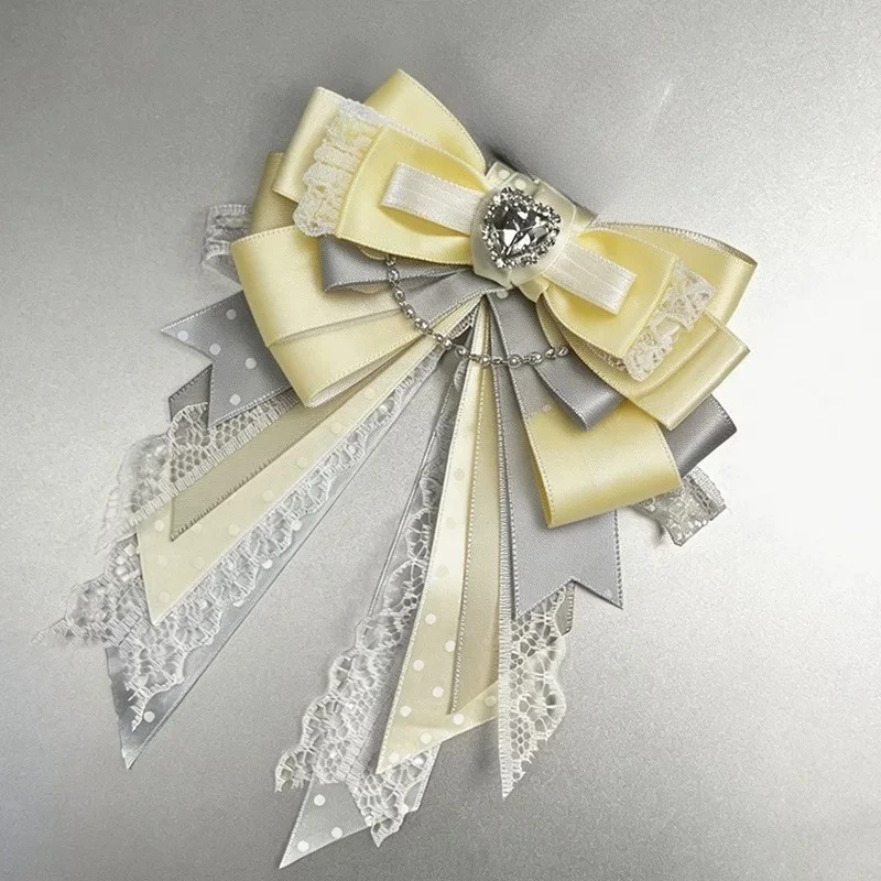 Luxuriöse Strass-Spitzen-Polka-Dot-Schleife Konzert-Leitstab-Anhänger Niedliche Lolita Alltags-Damenkleid-Blusen-Korsage-Brosche Accessoire – Detail 3