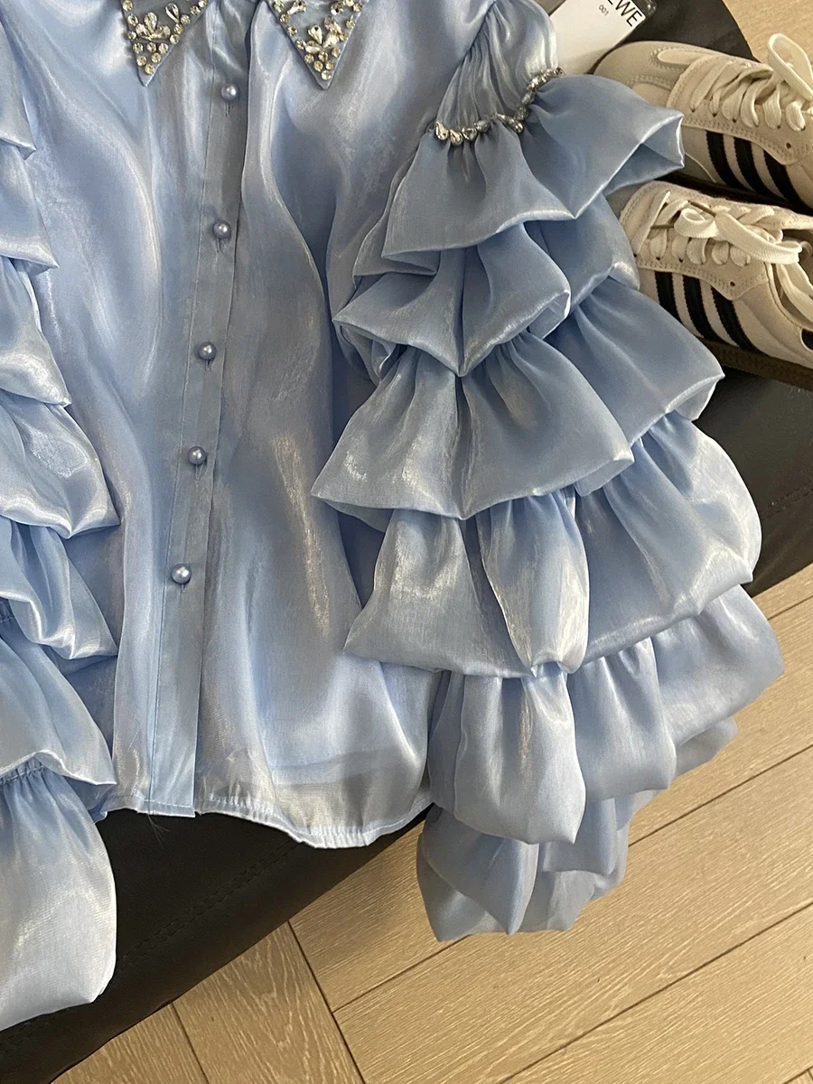 2025 Primavera Nuova camicia alla moda chic Bellissimo diamante Comfort allentato Camicie con bordo foglia di loto Manica lunga femminile Top monopetto