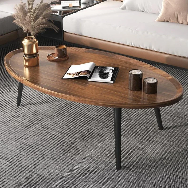 Tea table is simple, modern, and simple. Small living room, small layout, sofa, side table, wooden legs, circular tea table