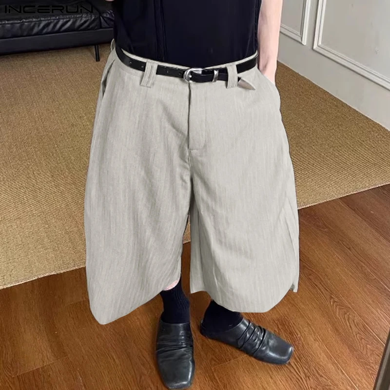 

INCERUN Men Pants Button Joggers Oversize Solid Color Casual Calf-length Trousers Men Streetwear Pleated Fashion Wide Leg Pants
