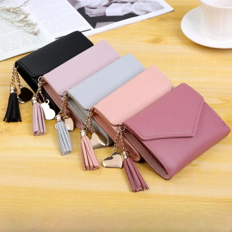 carteira-feminina-com-pingente-de-borla-e-tachas-porta-moedas-bolsa-clutch-moderna-e-elegante-acessorio-de-moda-feminina