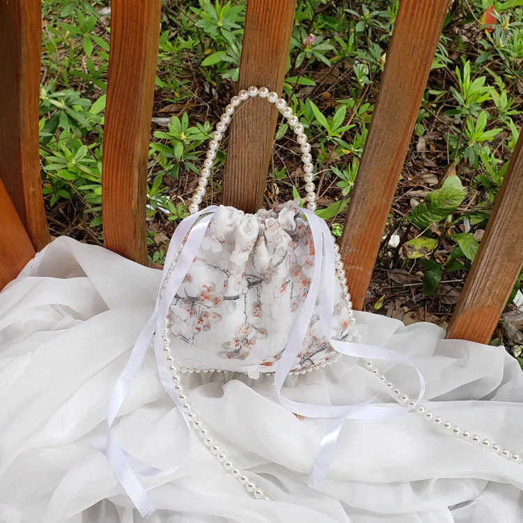 New Chinese Style Pearl Hanfu Bag with Three-dimensional Woven Flowers and Ancient Tassel Small Round Bag, hand-held bag