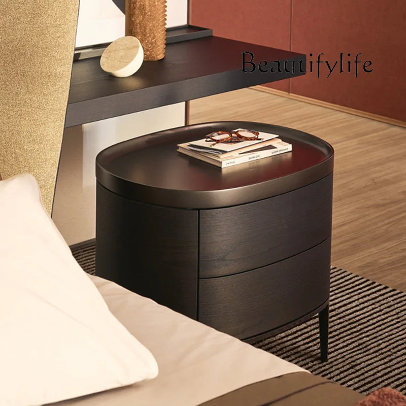 

Italian minimalist oval bedside table modern minimalist black bedside table bedroom creative side table