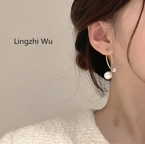 

Lingzhi Wu Double Pearl Fish Tail Cross Earrings Pearls Top Quality Ear Decoration New Arrival