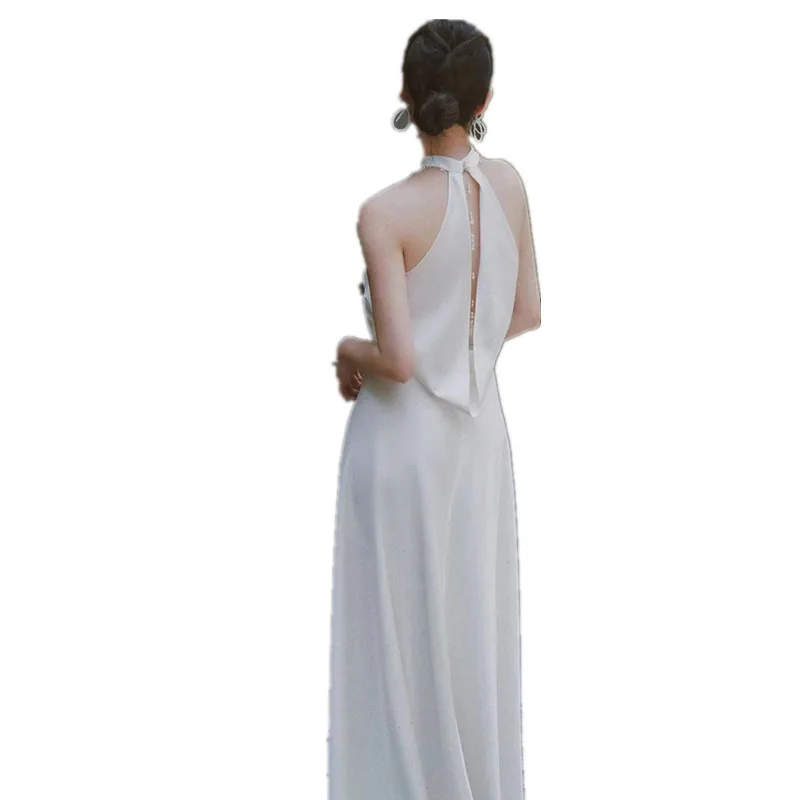 Abito da sposa leggero Halter Simple Travel Shoot Sexy Backless Super Fairy Bianco Dimagrante Coda di sirena Uscita di ricevimento in stile coreano