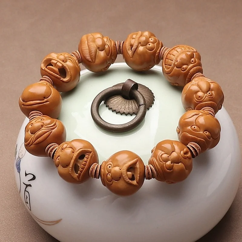 Iron Core Handmade Fun Olive Stone Bracelet With Big Bucktooth Expression, Hollow-Out Design, Short Round Beads
