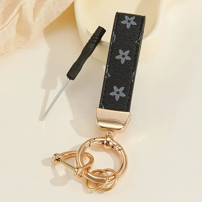 

1pc Elegant Flower Pattern Faux Leather Keychain - Durable Ring Buckle, Ideal for Keys
