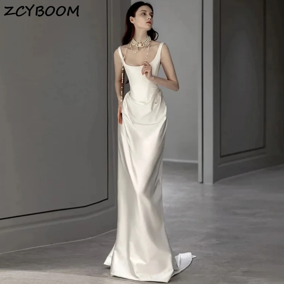 

Customized Elegant Ivory Mermaid Satin Party Wedding Dresses 2025 Scoop Neck Spaghetti Straps Backless Chapel Train Bride Gowns