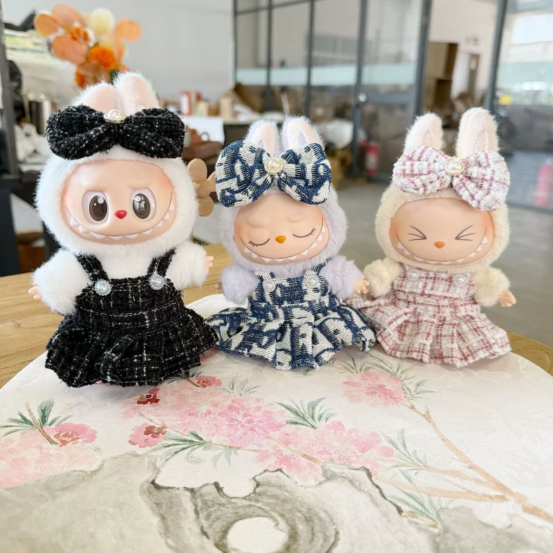 

The new 17CM rabub doll wears a blue flower sea strap skirt LABUBU clothes Haige skirt
