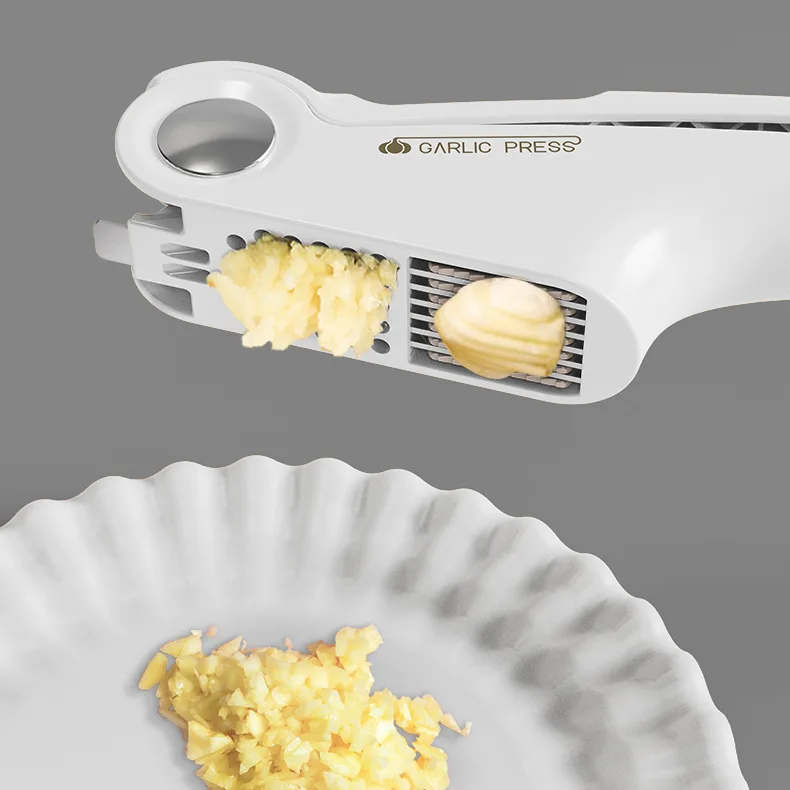 

Multifunctional garlic press can opener, kitchen manual garlic masher, three in one garlic slicer, peeler