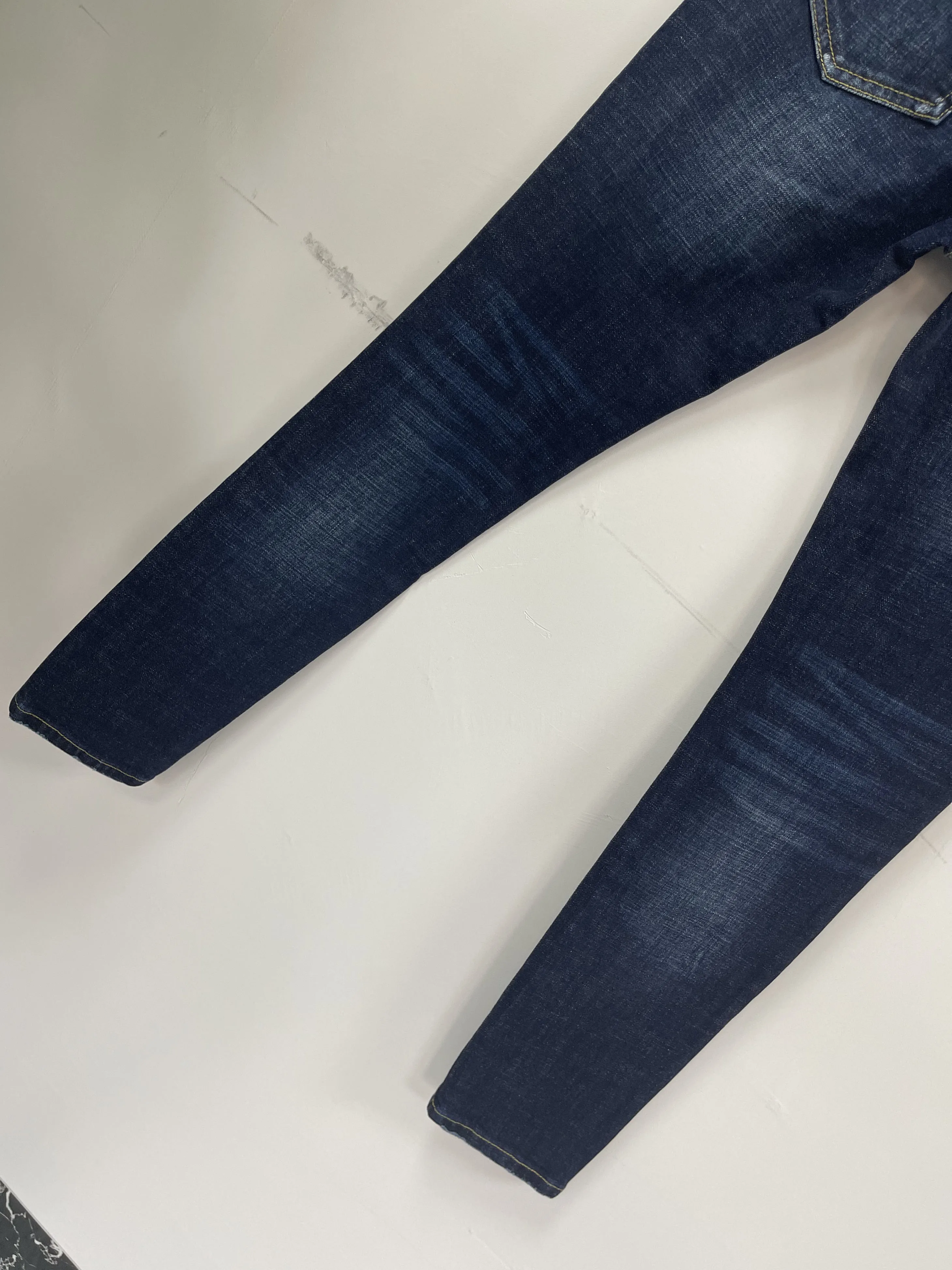 2024 New D2 Jeans Fashionable, Slim Fit, Minimalist, Worn Out Hole Patches, Painted Micro Elastic Feet Pants for Men