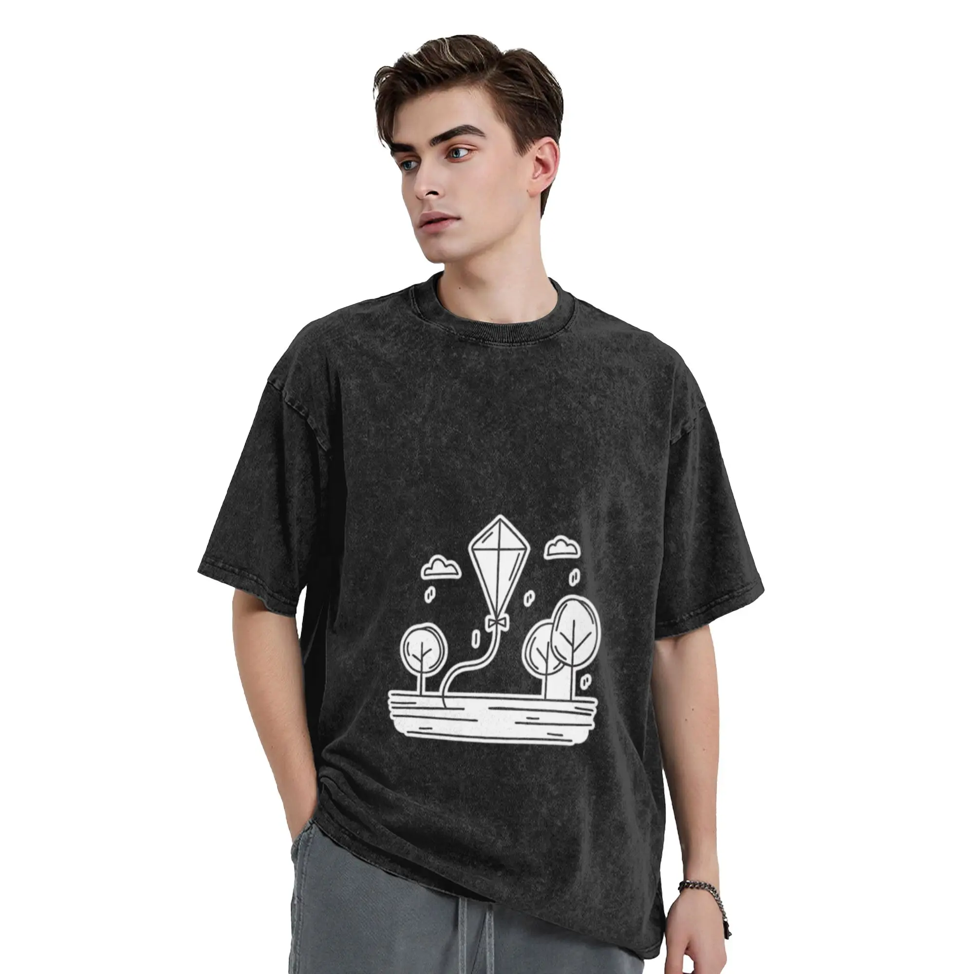 A kite soaring above a grassy field near trees Classic Chic A Vintage Oversized Cotton T-Shirts