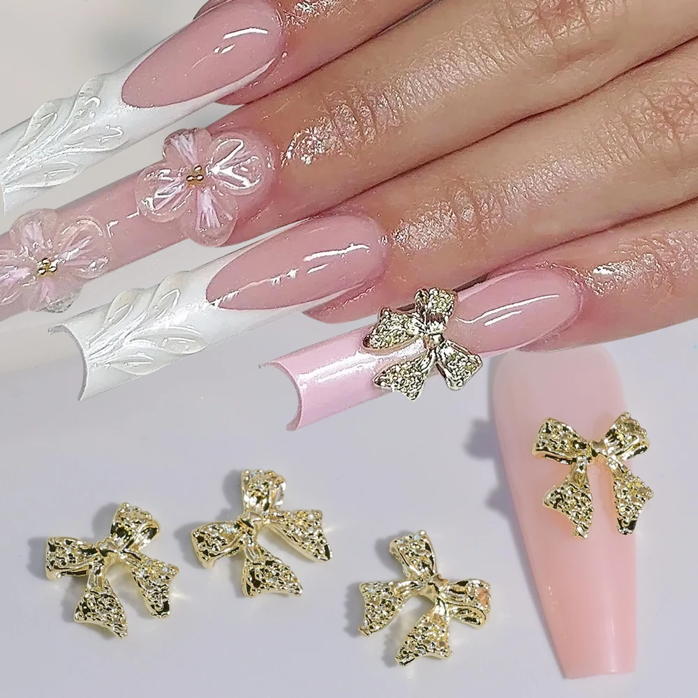 50 pezzi in lega di metallo bowknot gioielli per nail art oro argento papillon ciondoli per unghie super flash farfalla forniture per unghie accessori fai da te *