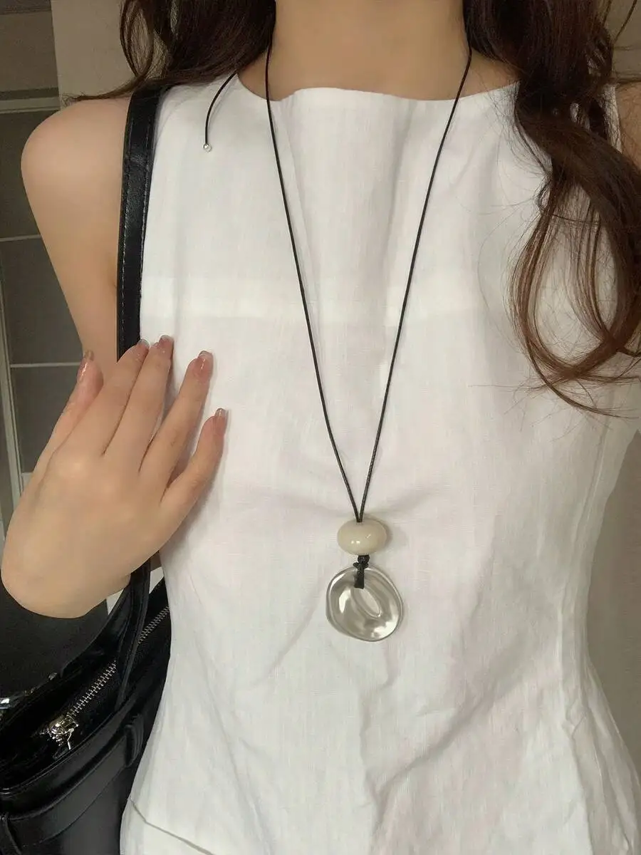 

Water drop acrylic pendant necklace with adjustable leather cord