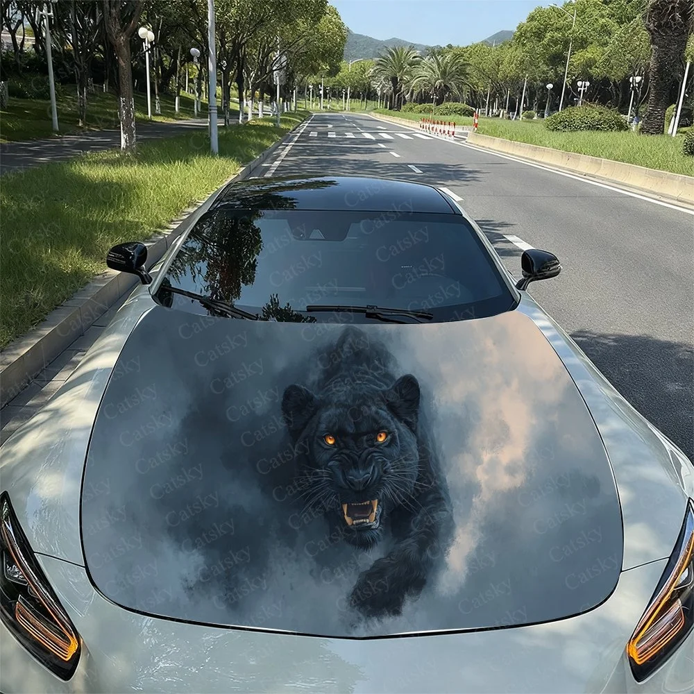 

This striking car hood wrap features a fierce panther with glowing eyes, set against a dramatic cloudy sky backdrop. Perfect fo