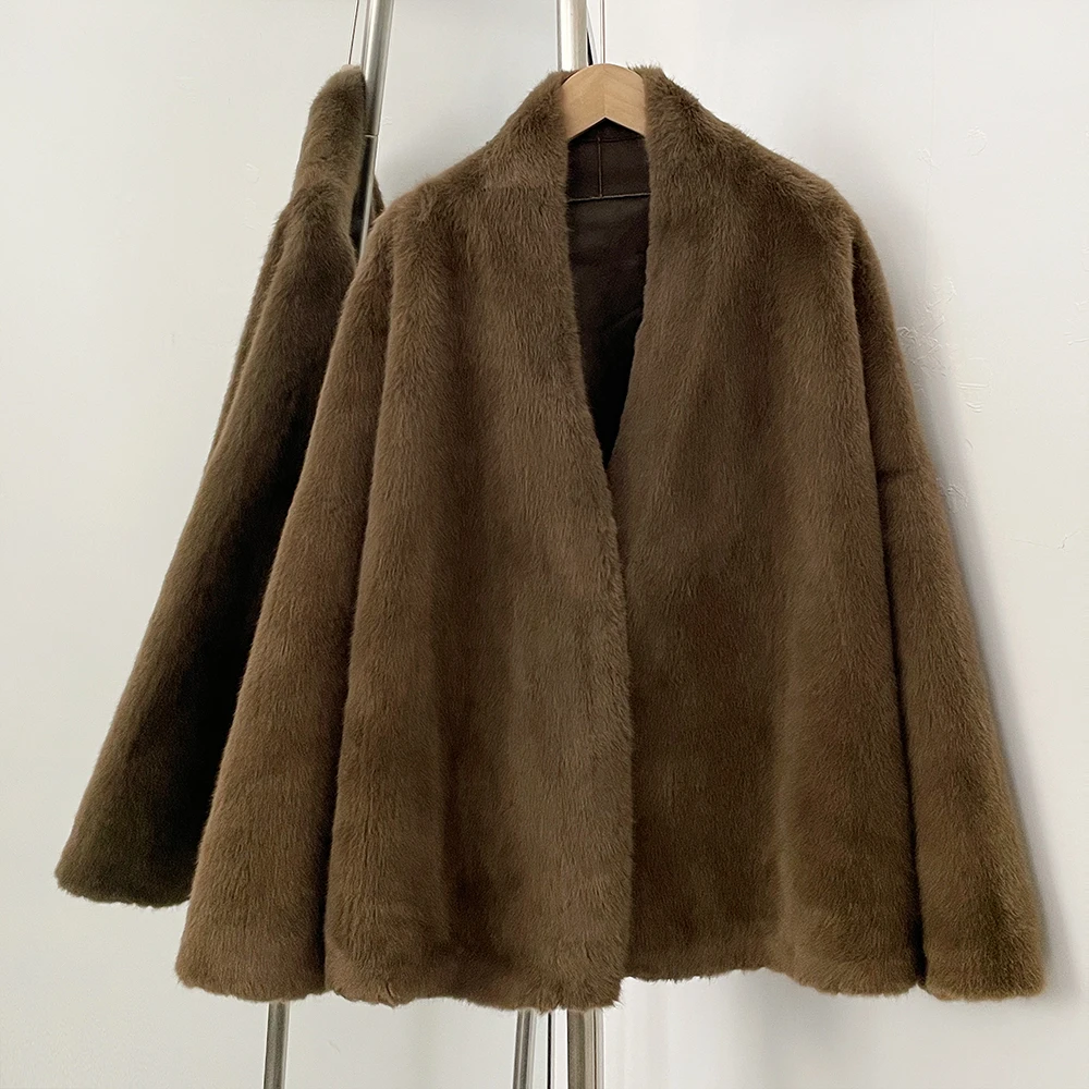 Abrigo de piel sintética para mujer, chaqueta holgada y esponjosa de manga larga para otoño e invierno, ropa superior Artificial de piel cálida y gruesa a la moda para mujer