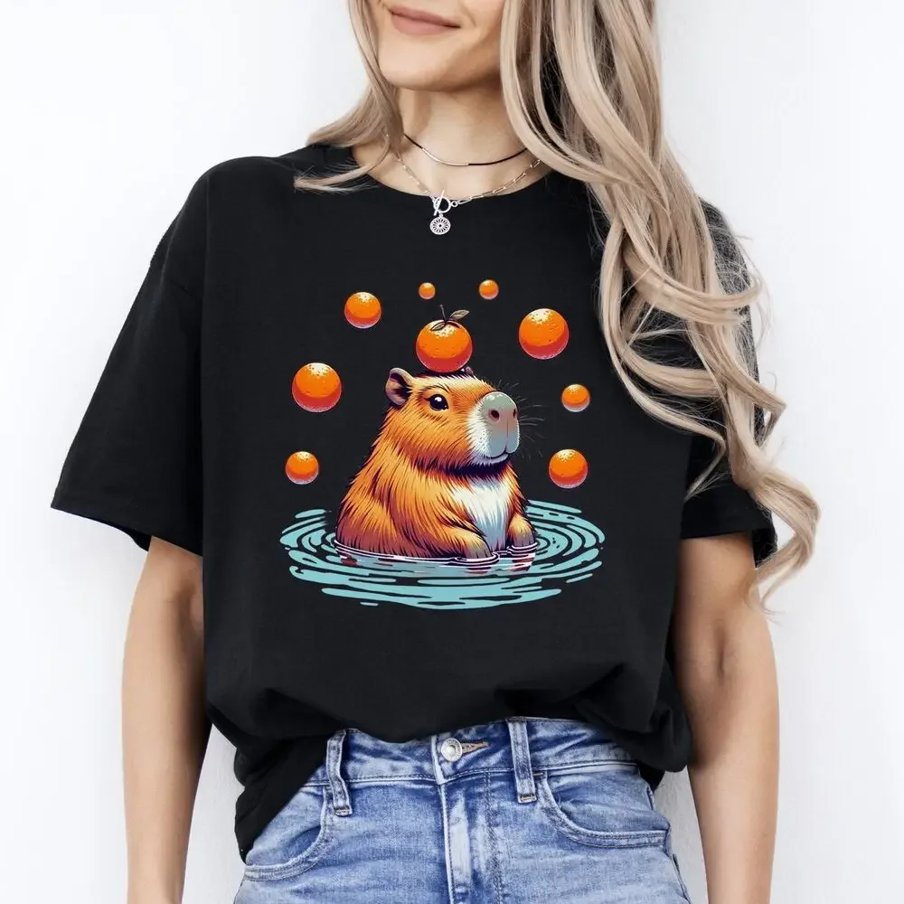 Capibara swimming with balls and apples T-Shirt gift Capibara mom Unisex tee Bla tops Unisex Summer Short Sleeve