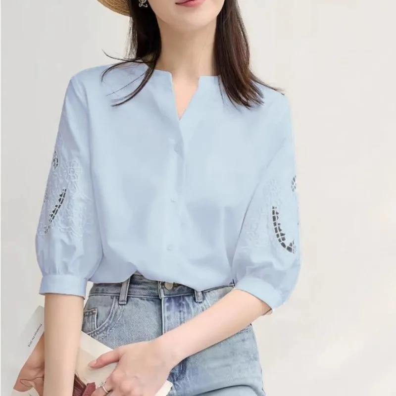

Women's Light Blue V Neck Blouse with Lace Cutout Puff Half Sleeve Casual Loose Shirt