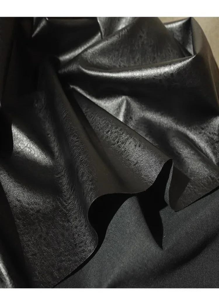 

Ткань из искусственной кожи черная матовая грубая текстура с хлопковой основой дизайнерская ткань для куртки одежды Оптовая Ткань сделай сам материал для шитья