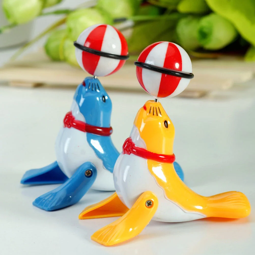 4pcs Seal with Ball Show Clockwork Toys Adorable Lifelike Seal Model Wind-up Toys Kids Gift Decorative Props Party Favors(Random