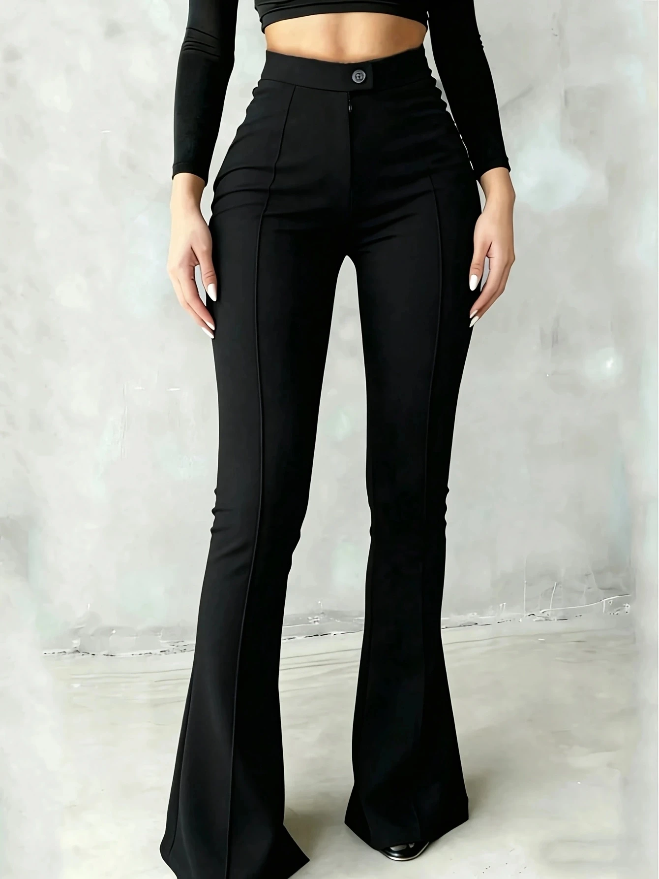 High-waist flared pants for women, featuring a front seam design, button closure, elastic black trousers suitable for both casua