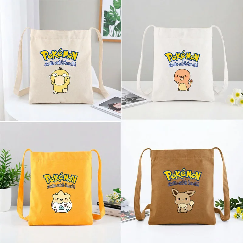 

Kawaii Pokemon Eevee Canvas Bag Ins Girl Psyduck Charmander Commute Shoulder Bag Handbag Cute Student Mew Bento Storage Bag