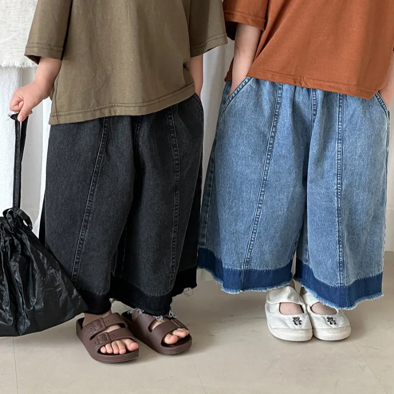

Children's jeans 2026 new loose casual simple baby boys and girls solid color black blue fringed jeans