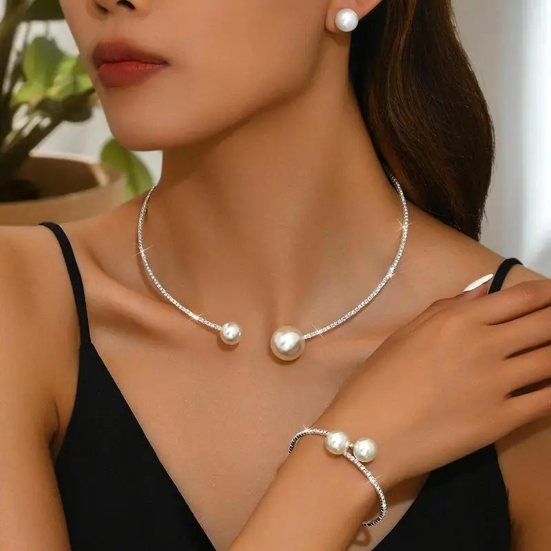 魅力的な 2 ピースの女性用パール ラインストーン ネックレスとブレスレット セット、結婚式のパーティーやギフトに最適です。