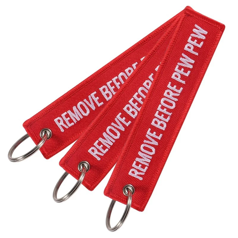 Entfernen Sie vor dem „Pew Pew“-Satz. Schlüsselanhänger für Motorräder und Autos, Rucksack-Schlüsselanhänger, neuer bestickter Schlüsselanhänger. – Detail 3
