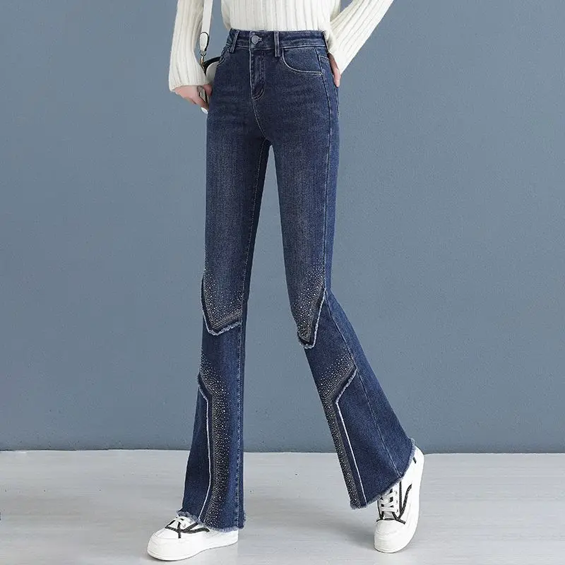 Hot stamping micro flared jeans women 2026 spring new slimming versatile fashion design sense micro flared wide leg pants