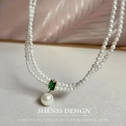 Elegant imitation pearl double-layer neck chain with green zircon pendant for women