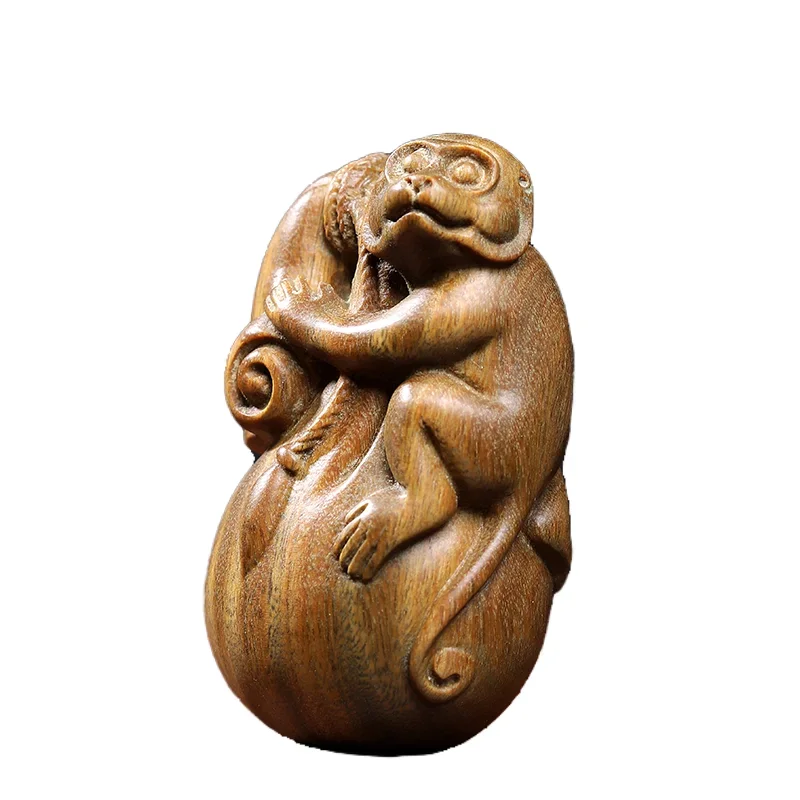 Natural green sandalwood carving zodiac monkey play hand handles money bags creative solid wood handicrafts