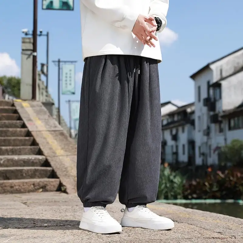 Calça masculina retrô japonesa Calça de veludo cotelê de outono para homens Cintura elástica Antirrugas Calças masculinas folgadas